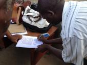 Legal consultation between migrant mineworker and LHR staff in Mozambique